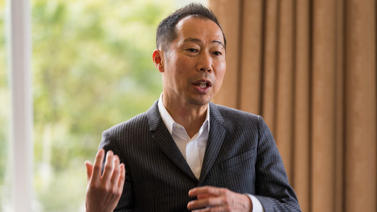 Hibino Junichi "Imo" Imokawa. He states that he wants to expand the new possibilities of the visual space through the development of event-specialized products. Photo